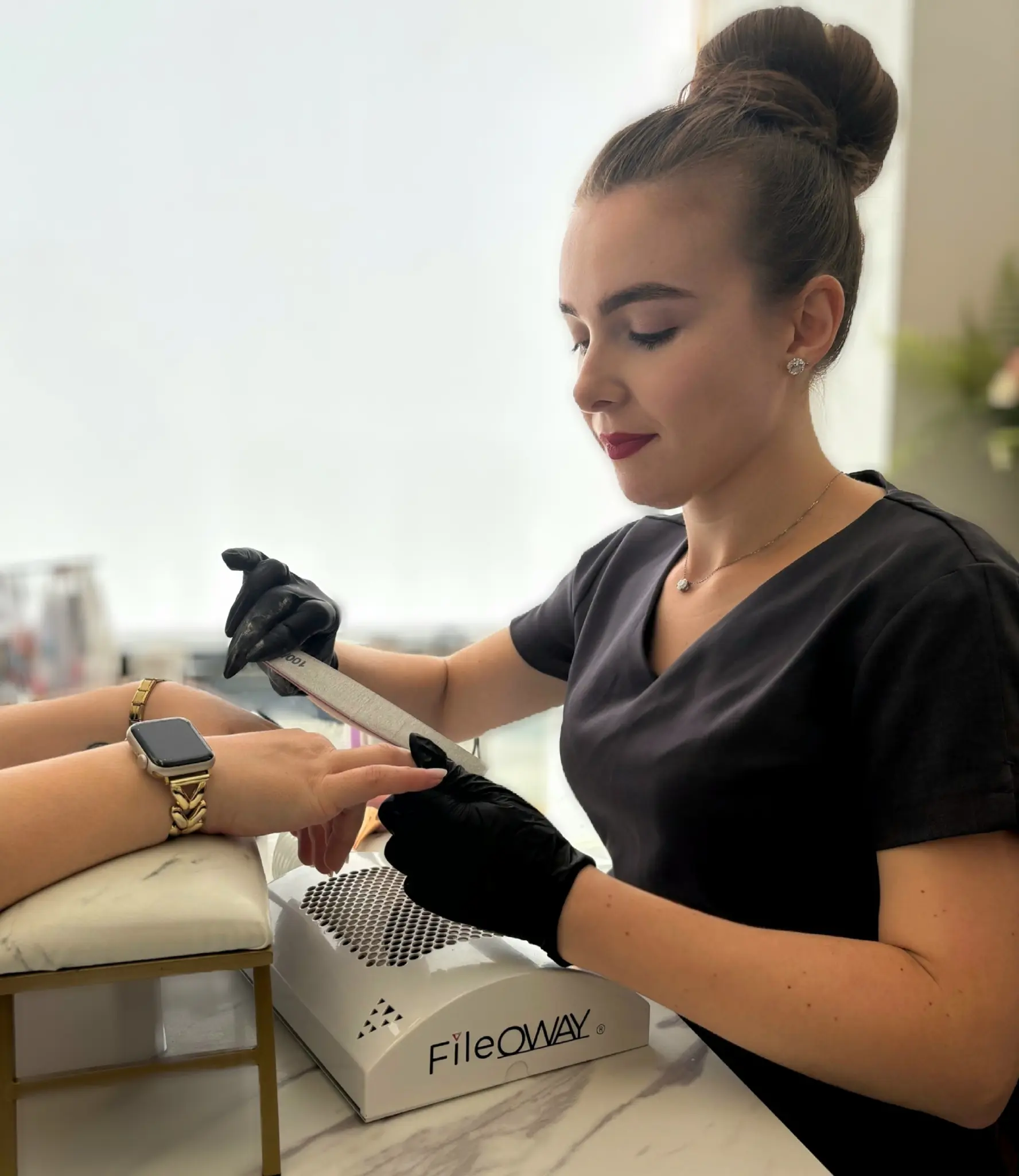 Radina Ignatova, Professional Nail Expert and founder of TheNailWiki and Artistic Touch Academy, demonstrating advanced nail techniques in her Dundee, Scotland studio