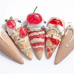 3D cake nail design by Radina Ignatova, Scratch Snap April 2026 winner